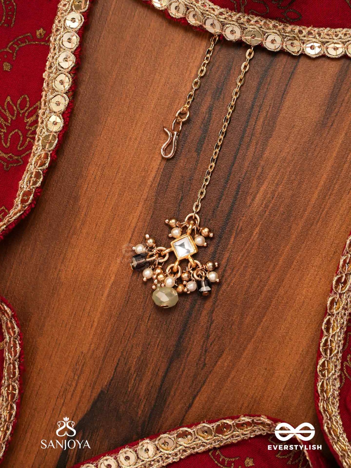 HARSHITA - THE JOYFUL ONE- DELICATE PEARL MAANGTIKA WITH MINI KUNDAN BLOOMS AND GREEN GEM DROPLETS