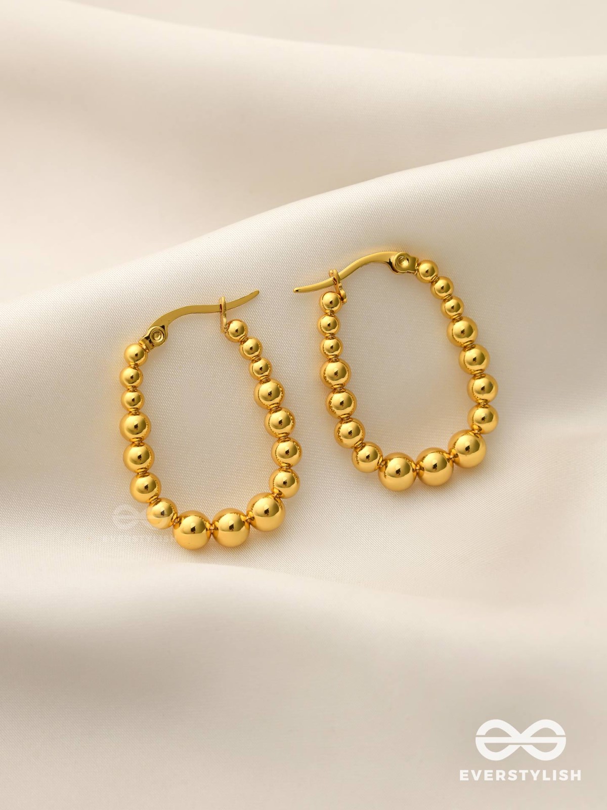 SUNBURST HOOPS – DELICATE DROP-SHAPED STAINLESS STEEL EARRINGS