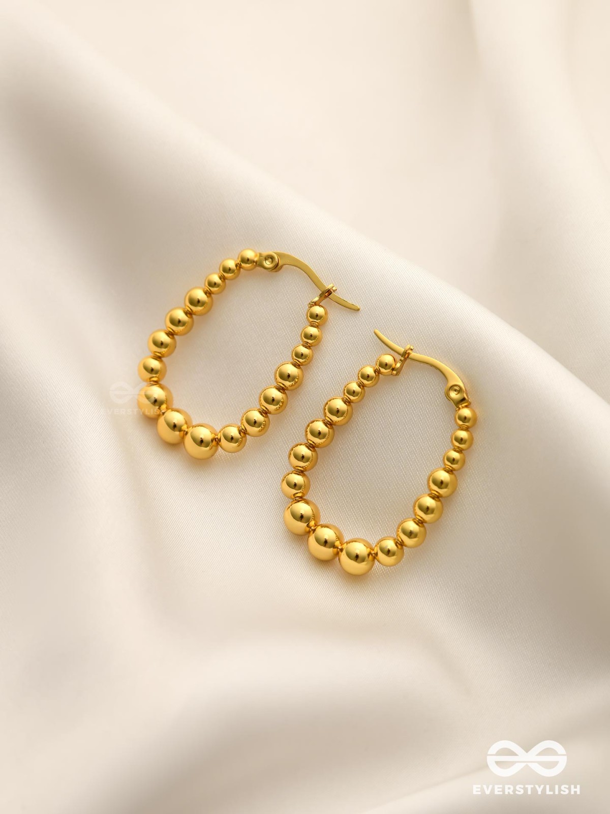 SUNBURST HOOPS – DELICATE DROP-SHAPED STAINLESS STEEL EARRINGS