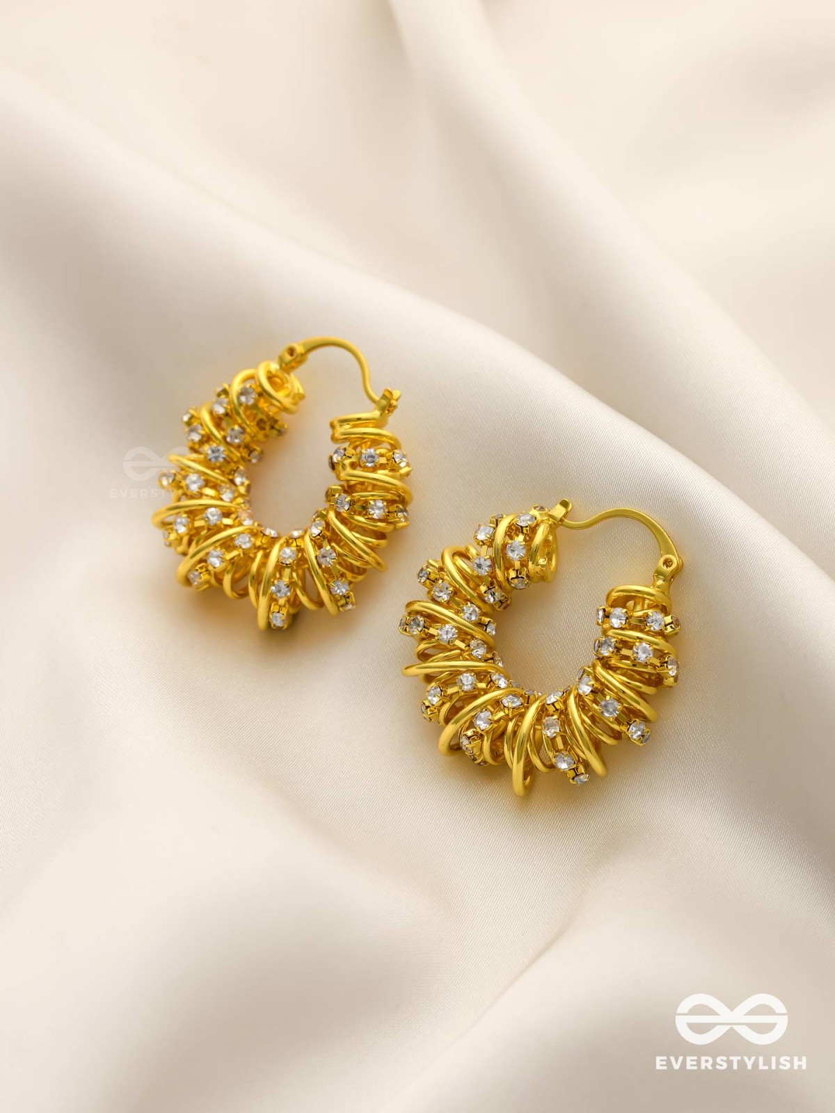 LUSTROUS SWIRLS-  INTRICATE TWISTED GOLD EARRINGS WITH SHIMMERING STONE