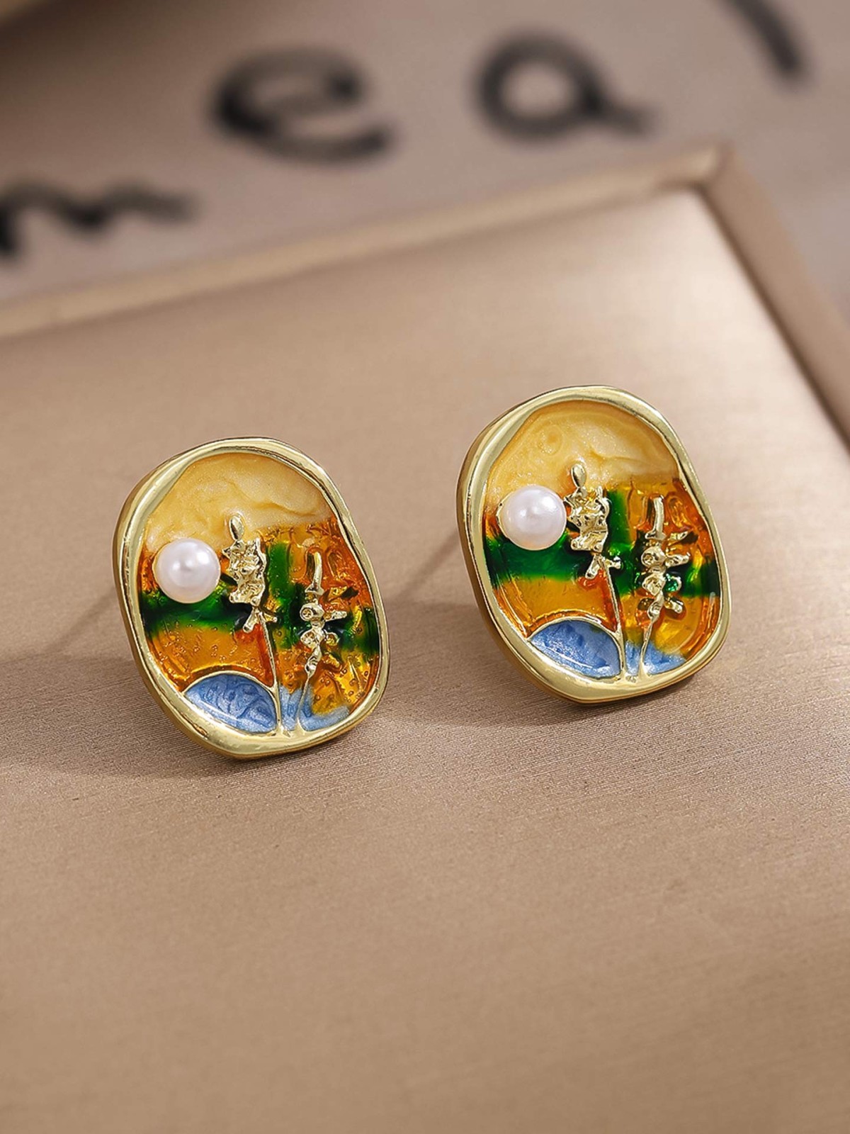 SUNLIT BLOOM-  ENAMEL EARRINGS WITH FLORAL MOTIF AND PEARLS