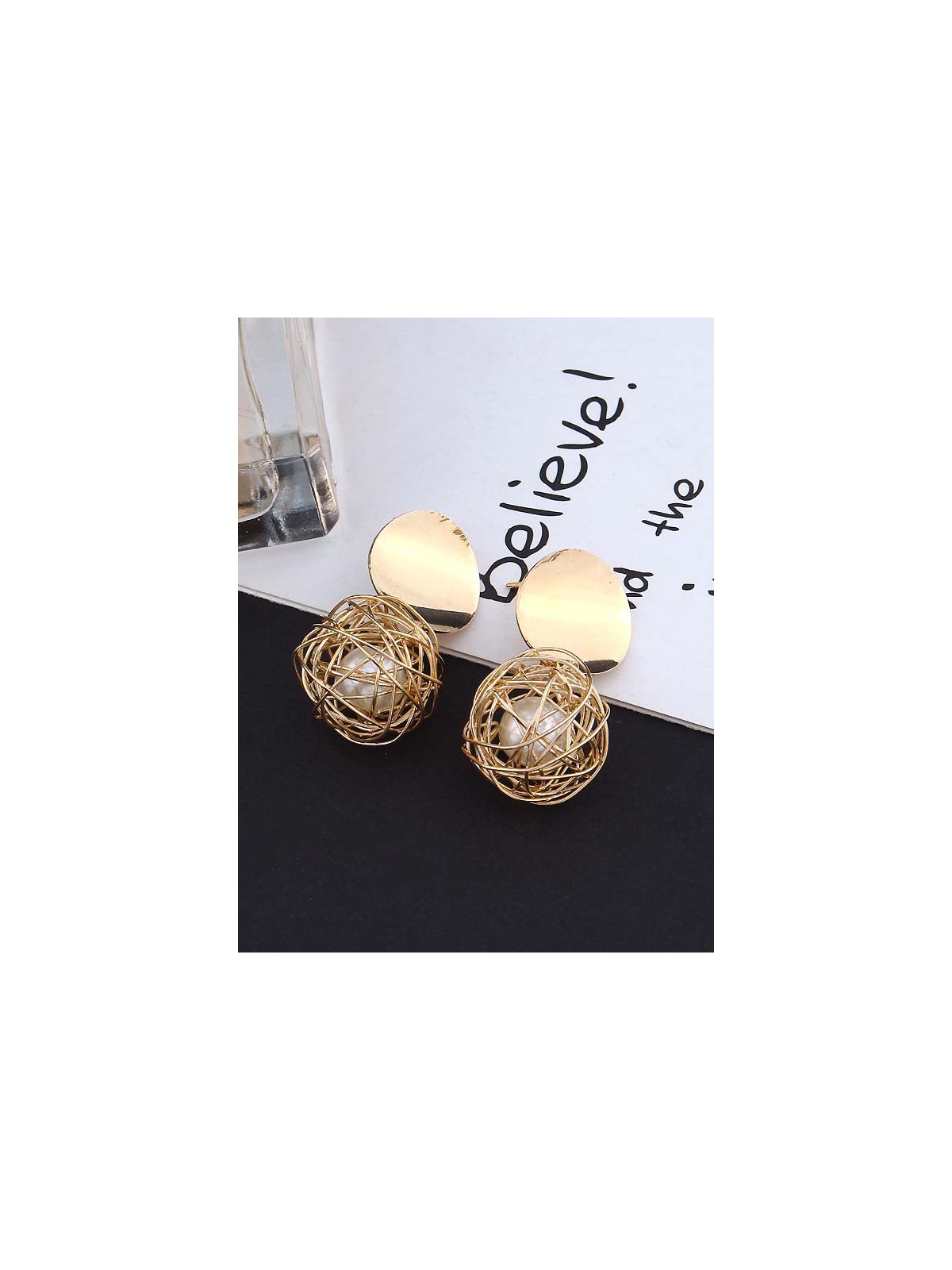 Mirror reflection- pearl in a cage of gold earrings