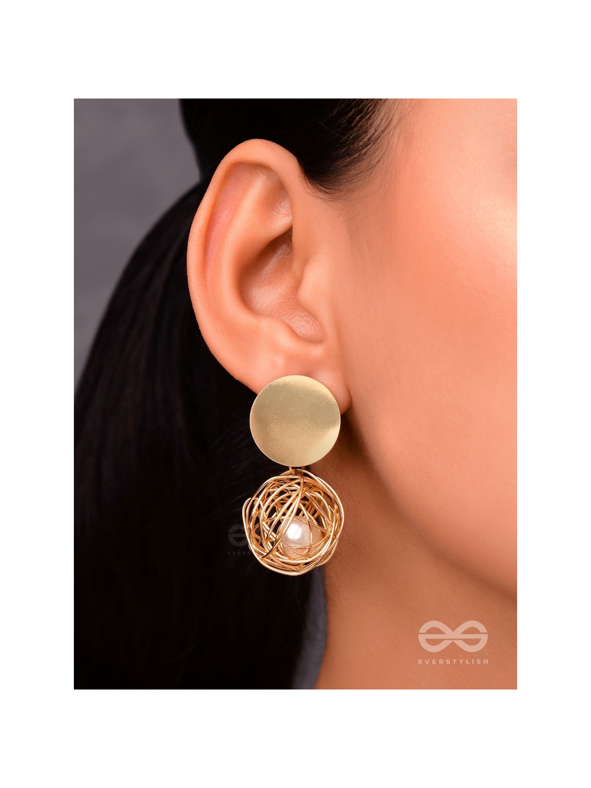 Mirror reflection- pearl in a cage of gold earrings