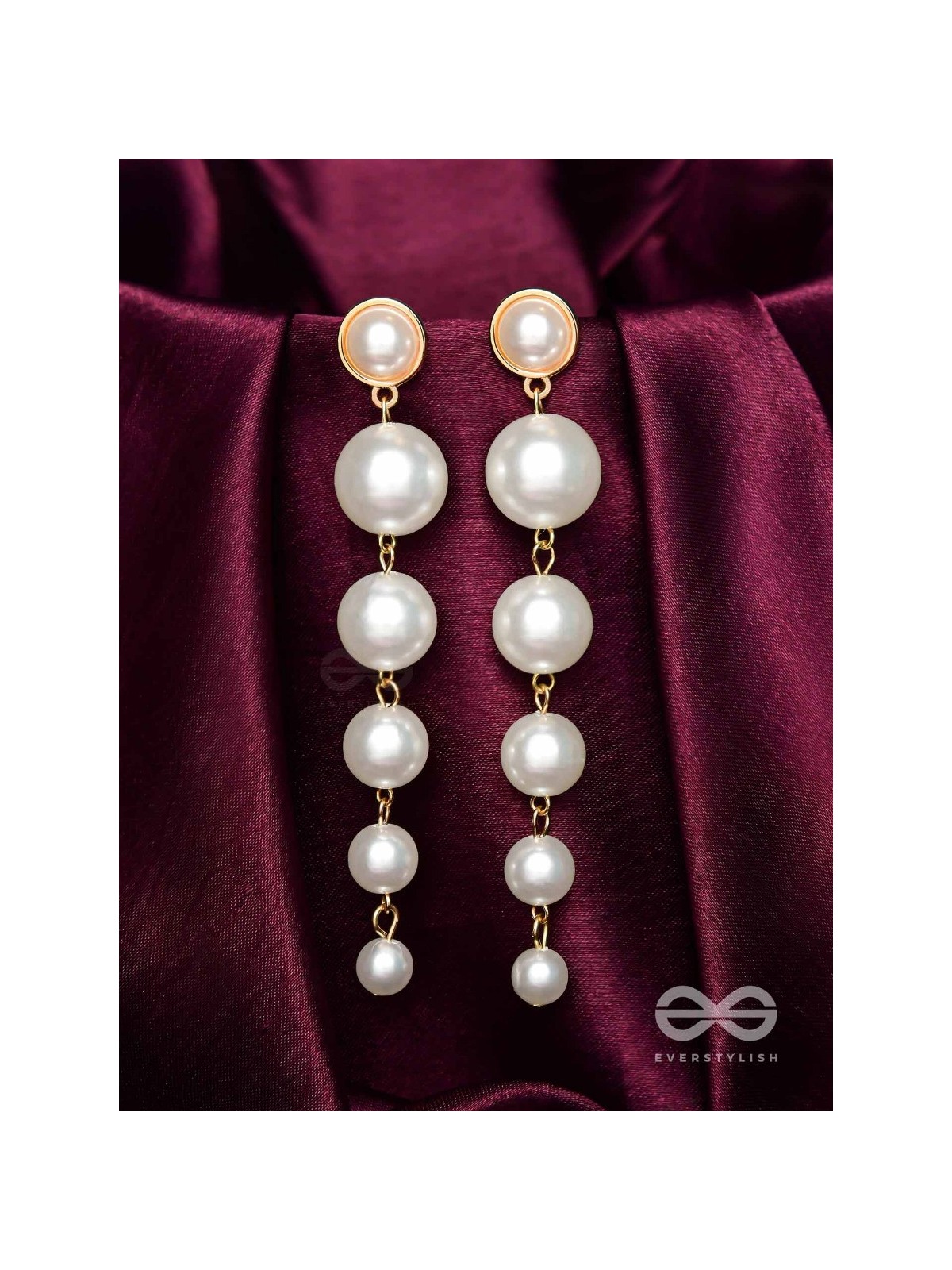 Elegance is a deadly weapon- white pearls statement earrings