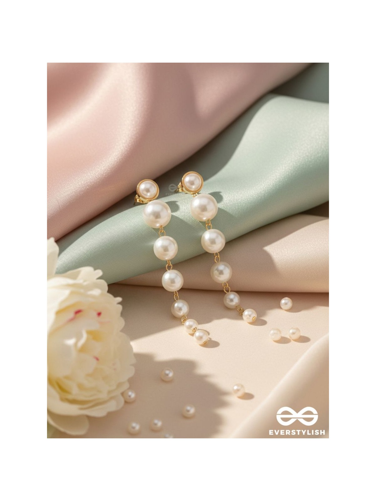 Elegance is a deadly weapon- white pearls statement earrings