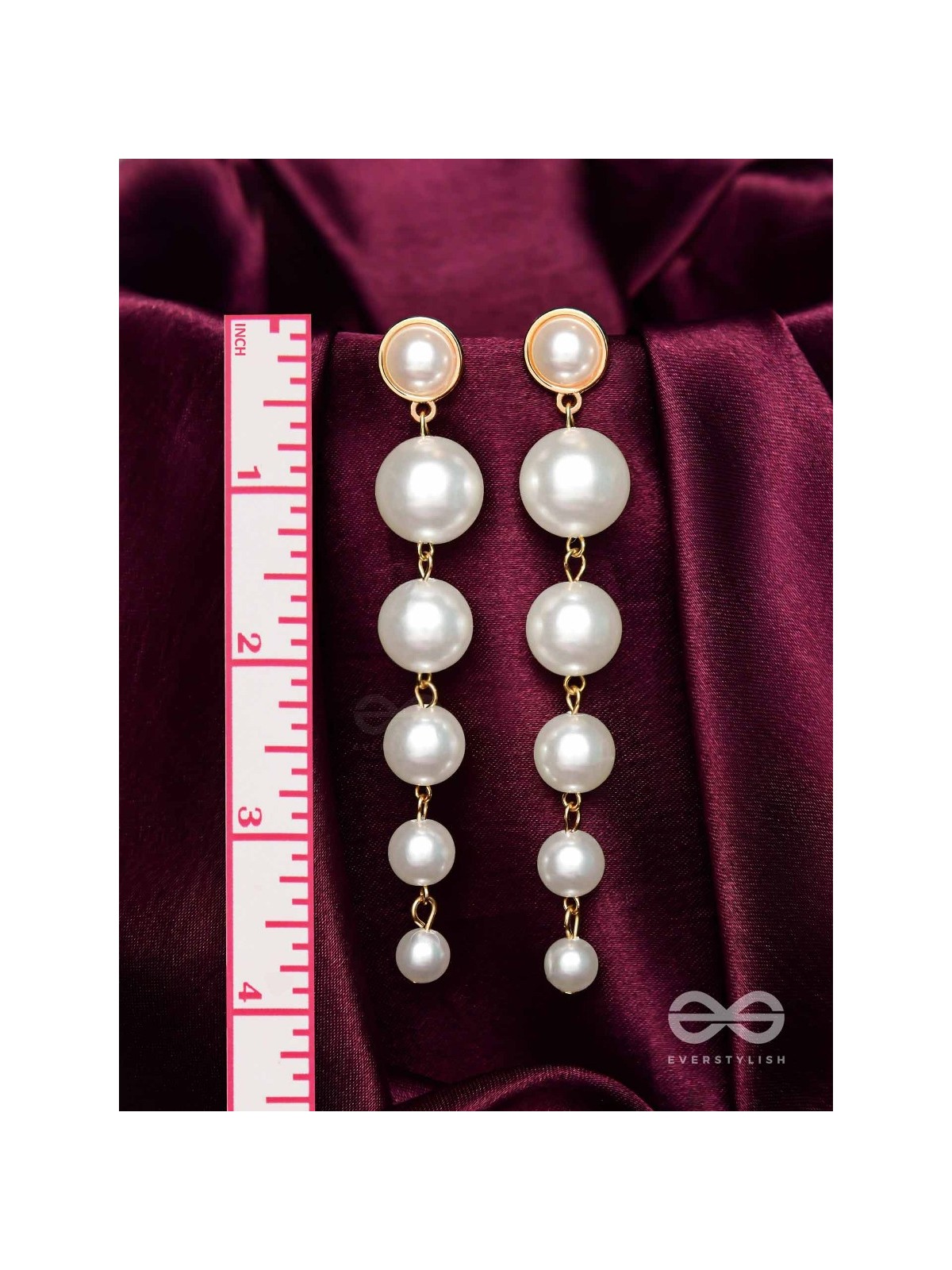 Elegance is a deadly weapon- white pearls statement earrings