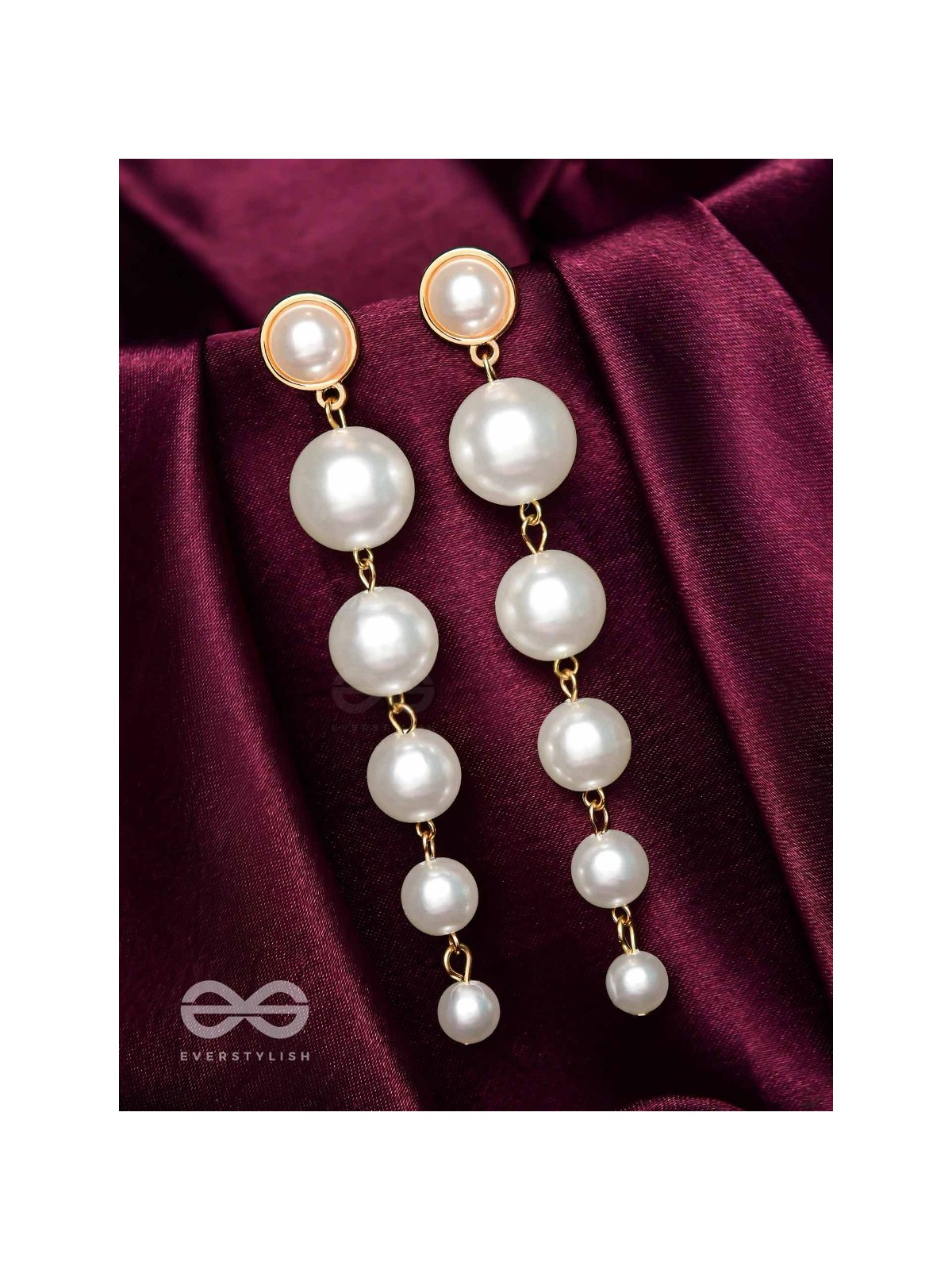 Elegance is a deadly weapon- white pearls statement earrings