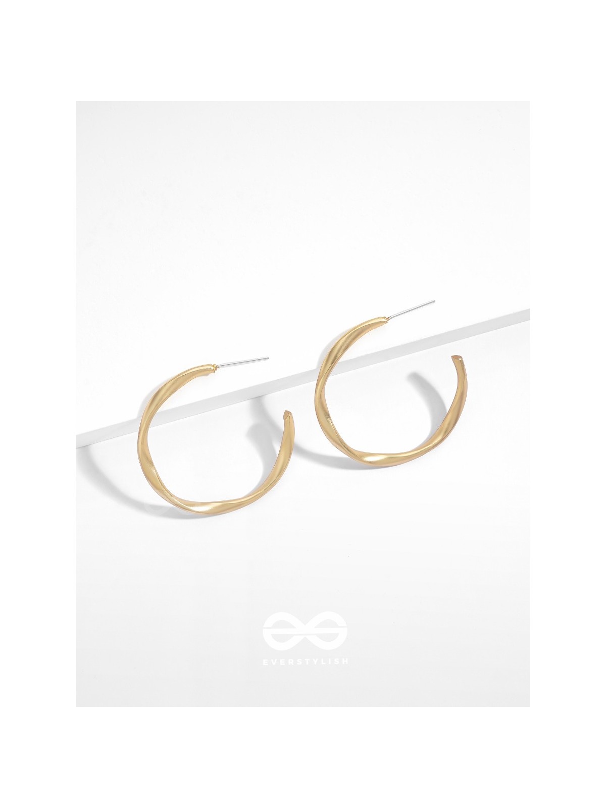 The Subtle Affirmation Golden Twists Hoop Earrings