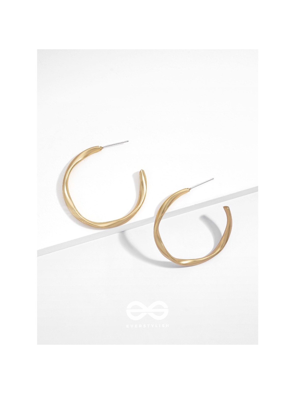 The Subtle Affirmation Golden Twists Hoop Earrings