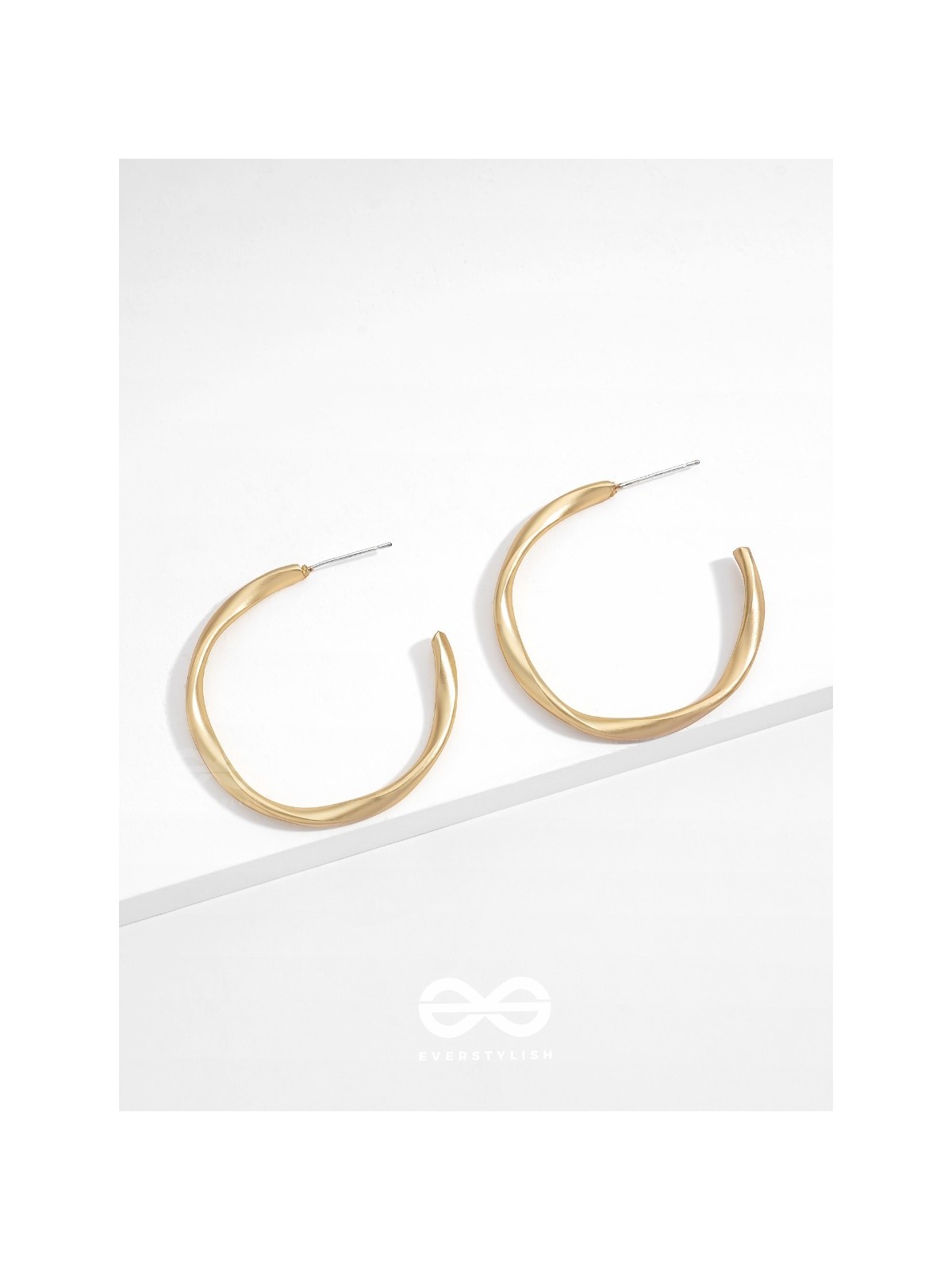 The Subtle Affirmation Golden Twists Hoop Earrings