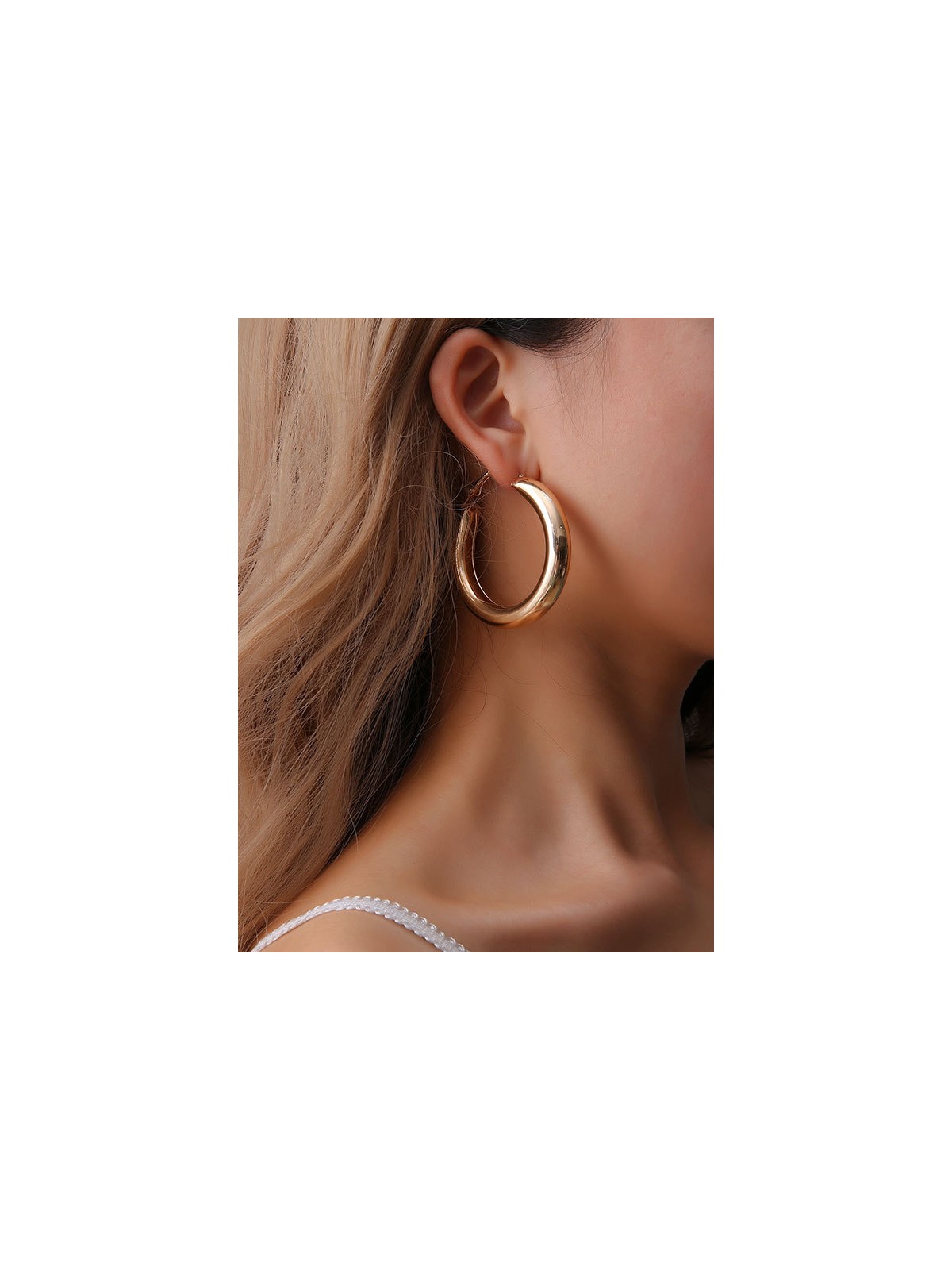 A Fashionista’s Dream - Glittering gold loops