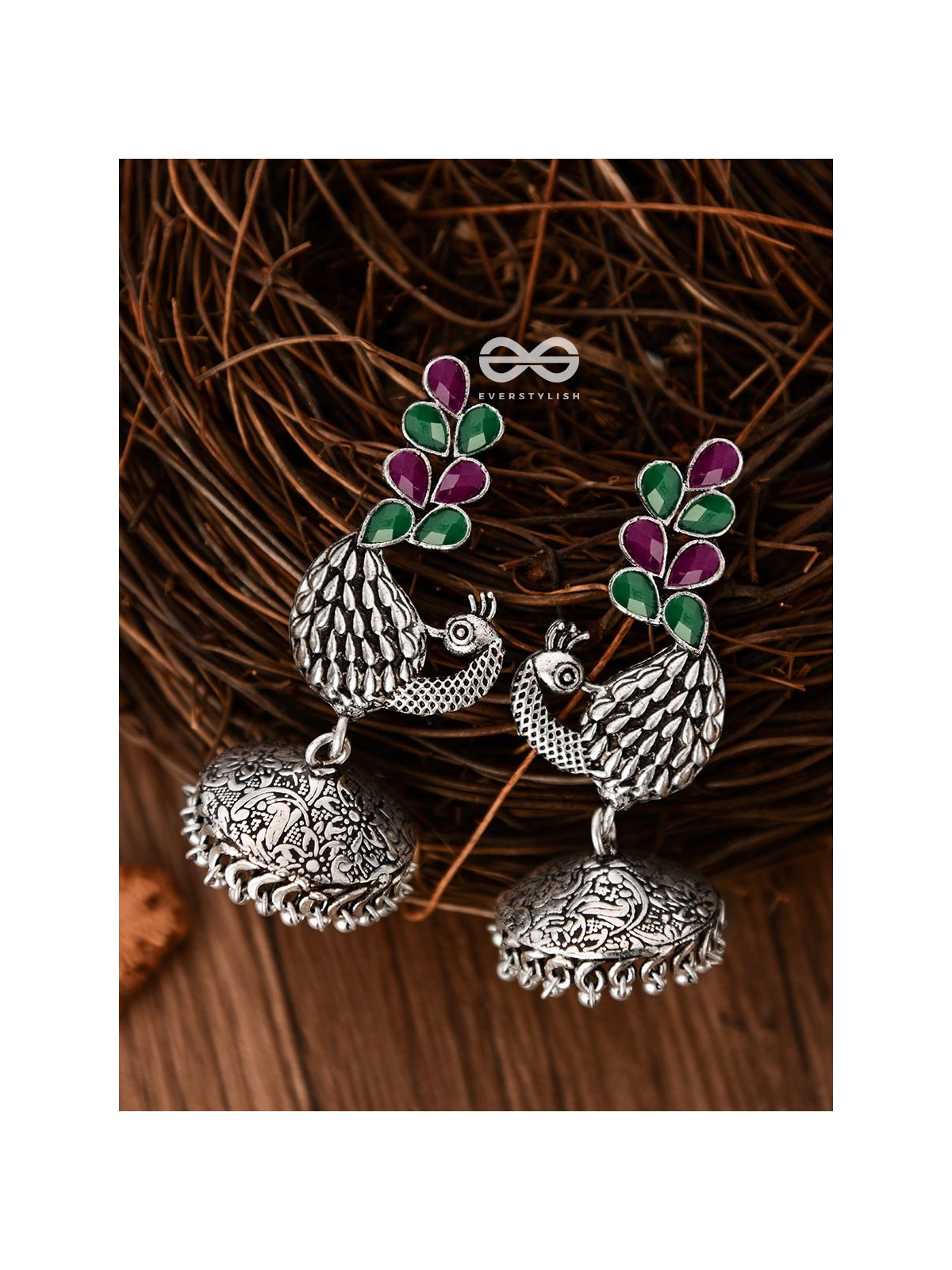 The Dancing Peacocks Engraved Jhumkis (Ruby Emerald) - Embellished Oxidised Collection