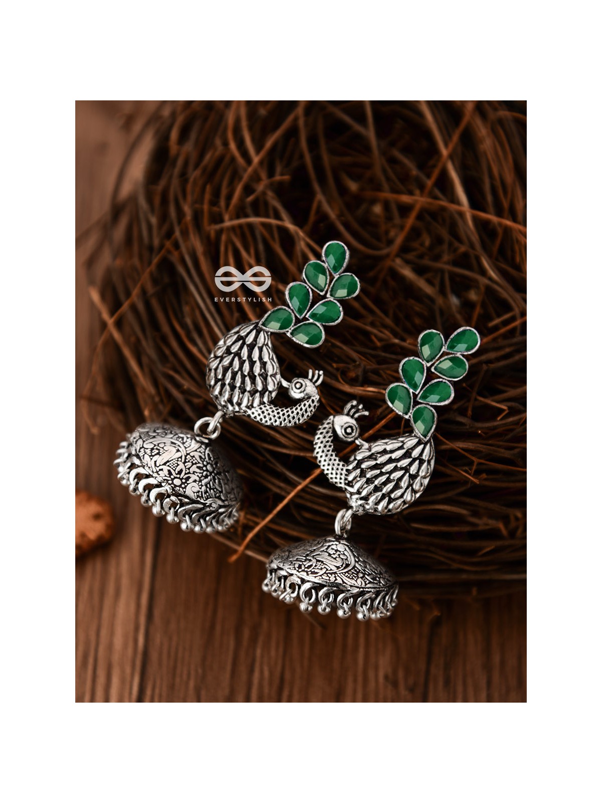 The Dancing Peacocks Engraved Jhumkis (Emerald Green) - Embellished Oxidised Collection