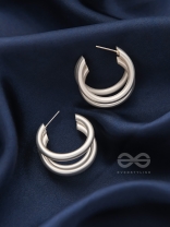 THE ELEGANT TURNS - MATTE FINISHED SILVER HOOPS