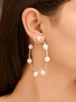 Pearl In The Gap- statement gold and pearl open hoops