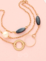 Day 'n' Nite- Pearl and Stones Studded Golden Bracelet