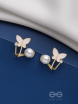 A WINGED WONDER - GOLDEN AND WHITE EAR JACKETS