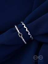 LIFE IN A ZIG-ZAG- SET OF 2 ADJUSTABLE SILVER RINGS