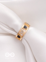ENVELOPED IN HEARTS - GOLDEN STATEMENT RING (BLACK)