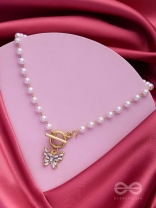 A FLYING MIRACLE - GOLDEN PEARL NECKPIECE