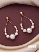 RADIANT PEARL TEARDROPS - GOLDEN EMBELLISHED EARRINGS