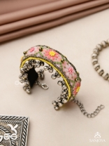 SUMANALEKHA-FLORAL PATTERN- SEMI-OXIDIZED BRACELET FEATURES GHUNGROO, BEADS, AND EMBROIDERED FLOWERS