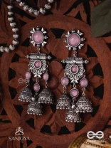 VIJAYAMUKTA-VICTORY PEARLS- REGAL OXIDIZED EARRINGS WITH A CENTRAL PURPLE STONE AND LAYERED JHUMKAS