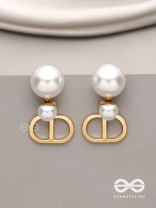 Starlit orb- dangling pearl earrings with golden spheres 