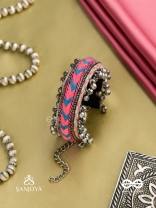 CHITRA DHARA – FLOW OF COLORS   EMBROIDERED BRACELET WITH A MIX OF COLORS AND INTRICATE THREAD WORK, ADORNED WITH GHUNGROO'S