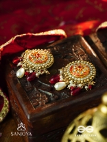 KUSUMAVALI - ROW OF FLOWERS - STONES, PEARLS AND RED BEADS KUNDAN HAND EMBROIDERED EARRINGS