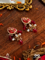 ARUNAMUKHI- FACE OF THE RED SUN- GLORIOUS KUNDAN EARRINGS WITH RED ENAMEL DETAILS AND PEARL EMBELLISHMENTS 
