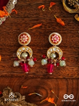 SHONAPRABHA- RADIANCE OF GOLD AND RED- HANDCRAFTED KUNDAN EARRINGS  WITH GOLDEN MOONS AND RED BEADS