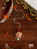 SHONAPRABHA- RADIANCE OF GOLD AND RED- HANDCRAFTED KUNDANMAANGTIKA  WITH GOLDEN MOONS AND RED BEADS