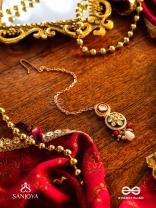 UNDARIKA - BEAUTIFUL ONE - INTRICATE KUNDAN MAANGTIKA WITH ENAMEL WORK AND PEARL DROPS