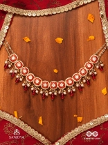 RUDRANJALI - SACRED RED OFFERING- TRADITIONAL RED ENAMELLED POLKI CHOKER WITH LUSTROUS BEADS AND PEARLS