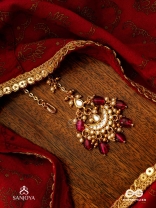 PUSHPALEKHA - STROKES OF FLOWERS - INTRICATE FLORAL ENAMELLED KUNDAN MAANGTIKA WITH RUBY BEADS
