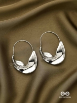 SILVER DRIFT- SCULPTED SILVER HOOPS WITH A FLUID