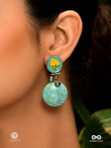 OCEAN SERENADE – OXIDISED DROPS WITH CRACKED SEA BLUE CHARMS