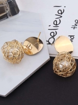 Mirror reflection- pearl in a cage of gold earrings