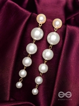 Elegance is a deadly weapon- white pearls statement earrings