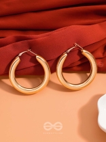 A Fashionista’s Dream - Glittering gold loops