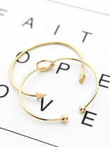 The Knot and Arrow Set of Two Bracelets - Golden