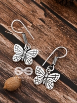 The Cutesy Butterfly Danglers - Tiny Trinket Earrings