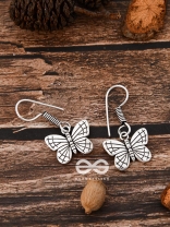The Cutesy Butterfly Danglers - Tiny Trinket Earrings