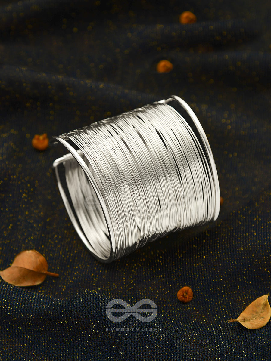 "SPUN OF SHIMMER" - STATEMENT SILVER BRACELET