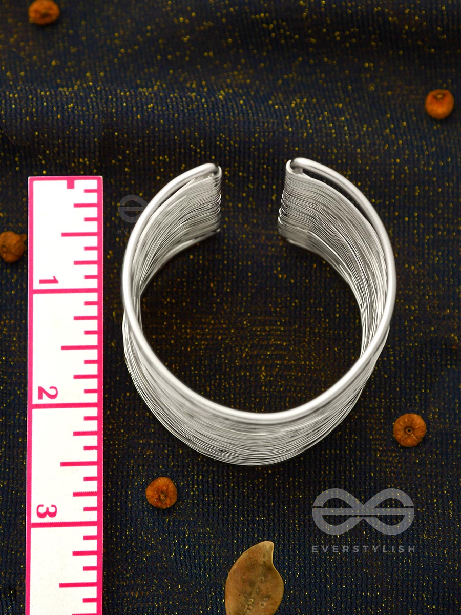 "SPUN OF SHIMMER" - STATEMENT SILVER BRACELET