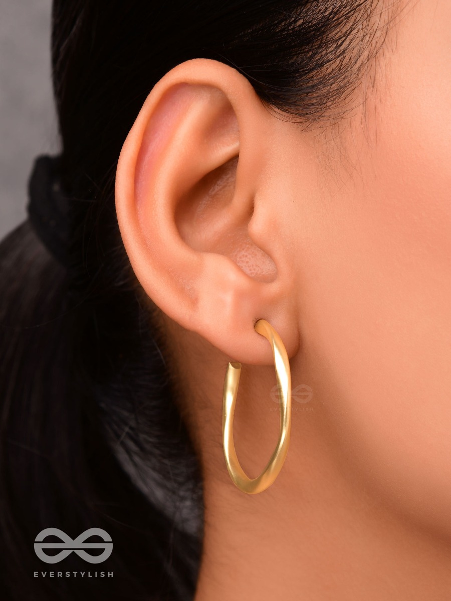 The Subtle Affirmation Golden Twists Hoop Earrings